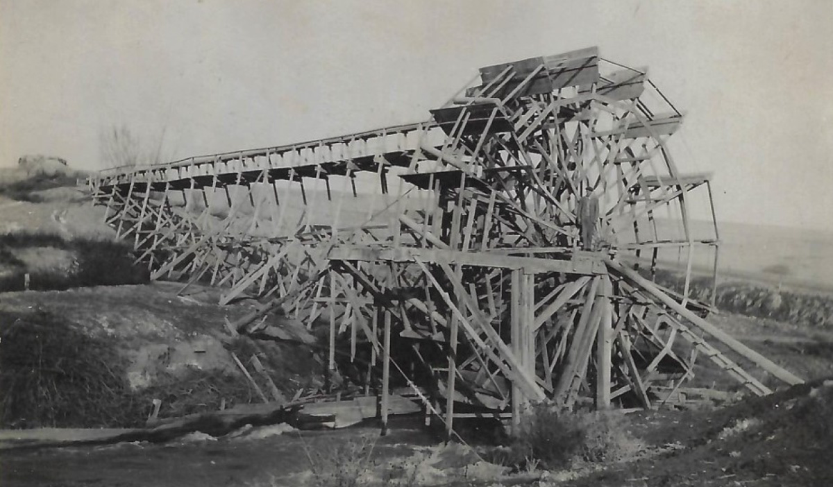 34-foot-diameter wooden water wheel designed to take and lift water 30 feet from the river in 1896